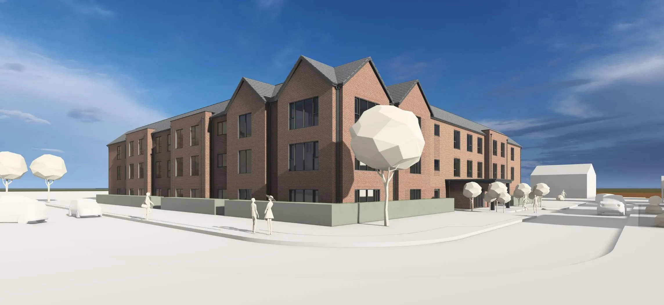 Visualisation of a three-storey red brick care home with feature gables in Poulton-le-Fylde, seen from the street